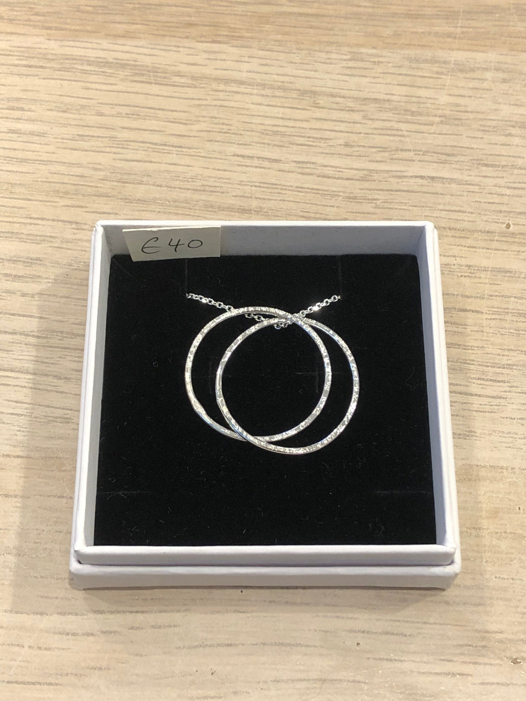 Medium two silver connecting ring necklace